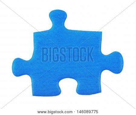 macro of single puzzle piece isolated on white