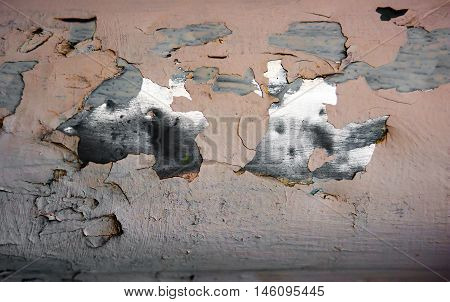 chipped metal plating on scratched wall , background