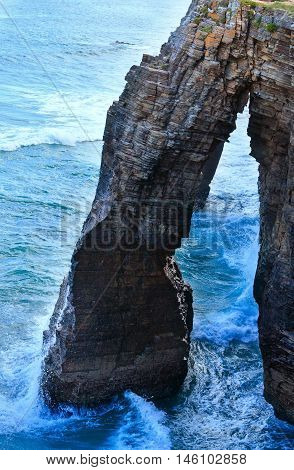 Natural Arch On Beach.