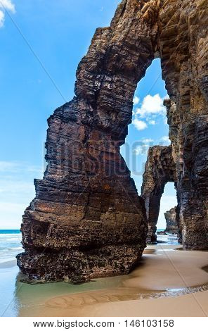 Natural Arches On Beach.