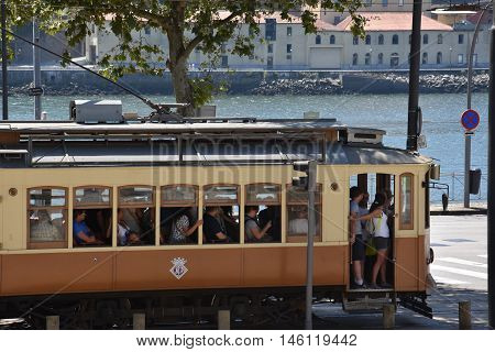 PORTO, PORTUGAL - AUG 22: Tram in Porto, Portugal, as seen on Aug 22, 2016. Porto has three regular heritage tram routes and they all use vintage tramcars exclusively.