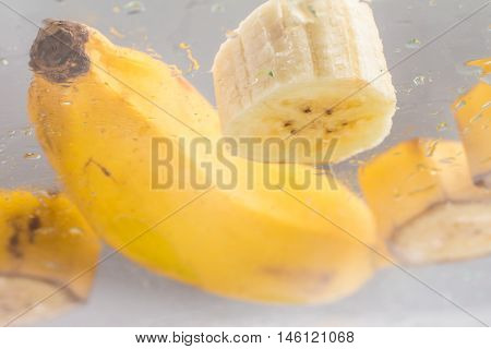 Slices of Banana Prata over a glass table