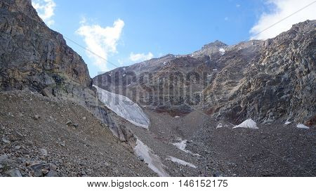 Alpinists at glacier, Bezengi area, Caucasus, Russia.