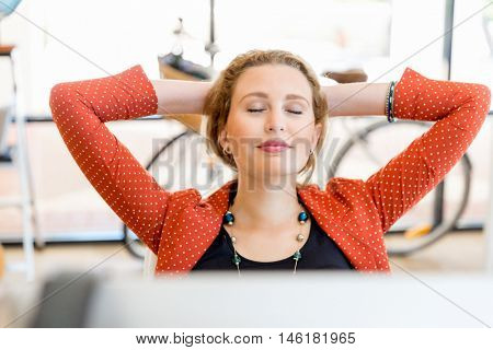 Young woman in office