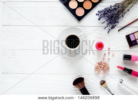 cosmetic set on white wooden table with lavender and coffie top view, mock-up