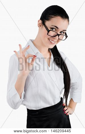 Perfect - business woman showing OK hand sign smiling happy. White background. Studio shot