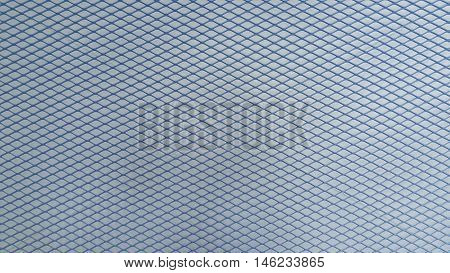 Metal grid and cyan cement wall texture. Abstract background and texture for design.