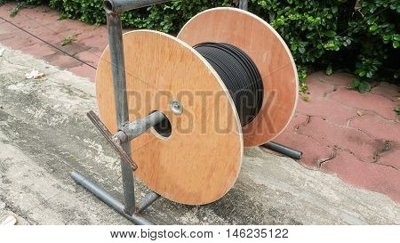 Wooden coil of electric and Fiber optic cable