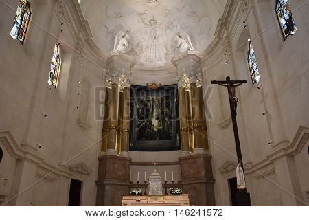 FATIMA, PORTUGAL - AUG 24: Sanctuary of Fatima in Portugal, as seen on Aug 24, 2016. It consists of a tall centralized bell-tower and nave, 213 ft in height, decorated by a 15,000 lb crown of bronze.