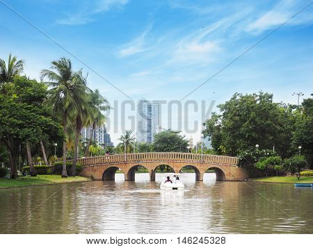 Arch brick bridge over the lake at Jatujak(Chatuchak) public city park in BangkokThailand