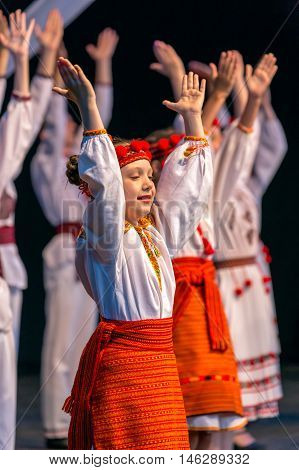 ROMANIA TIMISOARA - JULY 9 2016: Ukrainian child dancers in traditional costume present at the international folk festival "International Festival of hearts" organized by the City Hall Timisoara.
