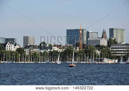 HAMBURG, GERMANY - AUG 26: Sailboats on Lake Alster in Hamburg, Germany, as seen on Aug 26, 2016. Hamburg was founded at the mouth of Alster river in the 9th century and has been used as a port since.