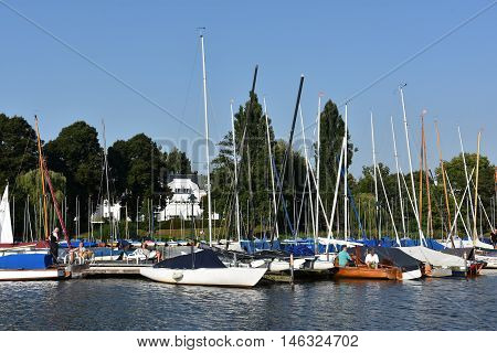 HAMBURG, GERMANY - AUG 26: Sailboats on Lake Alster in Hamburg, Germany, as seen on Aug 26, 2016. Hamburg was founded at the mouth of Alster river in the 9th century and has been used as a port since.