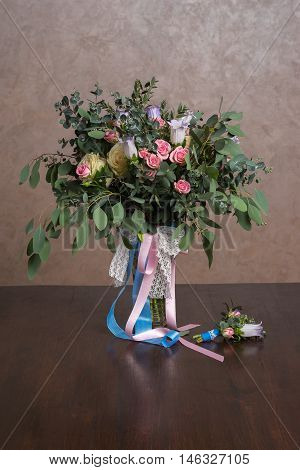 Still-life with a bouquet of flowers and apples