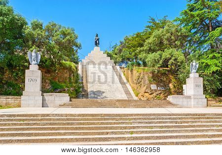 AJACCIO FRANCE - MAY 2 2013: The memorial complex of Napoleon Bonaparte in Place d'Austerlitz the statue of Emperor atop the tall stairway on May 2 in Ajaccio.
