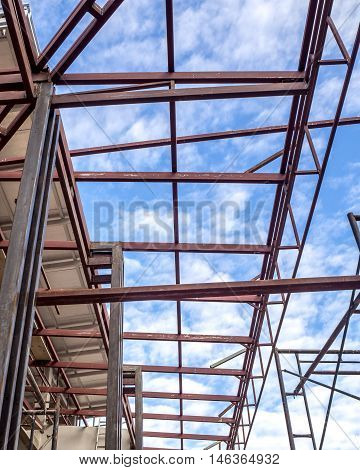 Construction roof metal with blue sky behind