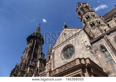 Main Tower Of World Famous Freiburg Muenster Cathedral, A Medieval Church In The City Of Freiburg