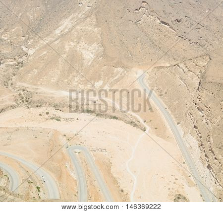 In Oman  The Old Mountain Gorge And Canyon The Deep Cloudy  Sky