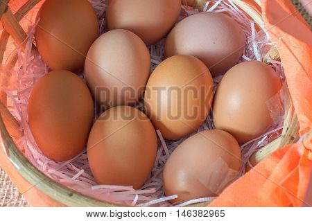 Eggs In Bamboo Basket On Jute Sack