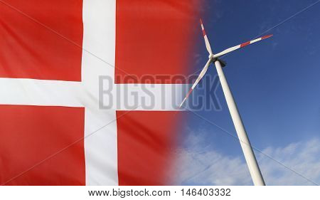 Concept clean energy with flag of Denmark merged with wind turbine in a blue sunny sky