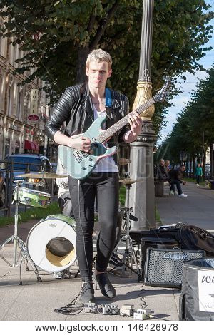 St. Petersburg, Russia-september 09,2016: The Street Musician Plays On The Street Of St. Petersburg.