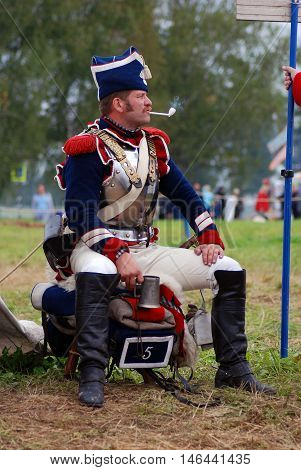 BORODINO MOSCOW REGION - SEPTEMBER 04 2016: Reenactor dressed as Napoleonic war soldier at Borodino battle historical reenactment in Russia. Color photo.