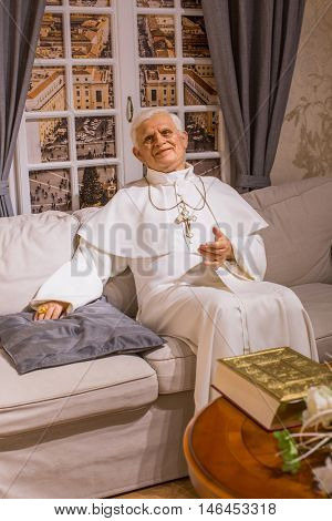 KRAKOW, POLAND - FEB 9, 2016: Pope Benedict XVI wax figure of Polonia Wax Museum at Main Market Square. The Wax Museum was opened in 2016, inspired by the organization in Krakow World Youth Day.