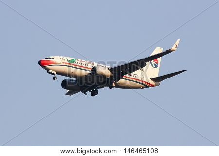 CHIANGMAI THAILAND - FEBRUARY 26 2014: B-5245 Boeing 737-700 of China Eastern Airline Landing to Chiangmai Airport from Kunming.