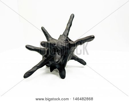 Body of micro bacterium made from plasticine isolated on white background