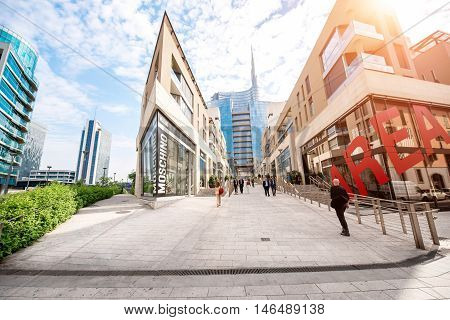 Milan, Italy - June 07, 2016: Vincenzo Capelli street with shopping boutiques and offices in Porta Nuova business district in Milan in the morning