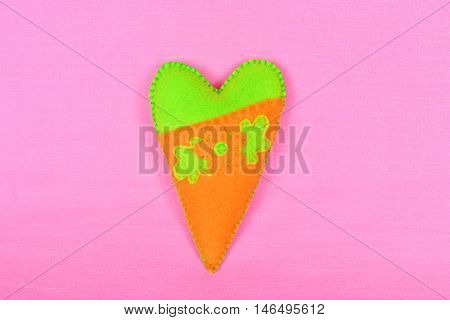 Felt heart set on pink background. Valentine's day symbol. Valentine's day gift