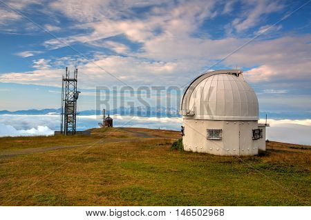 Observatory dome in the Gerlitzen Apls in Austria.View of the mountains in Slovenia.