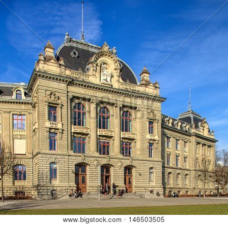 Bern, Switzerland - 29 December, 2015: the University of Bern building people at the entrance to it. The University of Bern is a university in the city of Bern, founded in 1834, regulated and financed by the Swiss Canton of Bern.