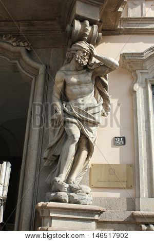 MILAN, ITALY - APRIL 16 2015: Close up of a statue at the entrance of Palazzo Litta in Milan Italy property of the ministry for Art and culture in Milan
