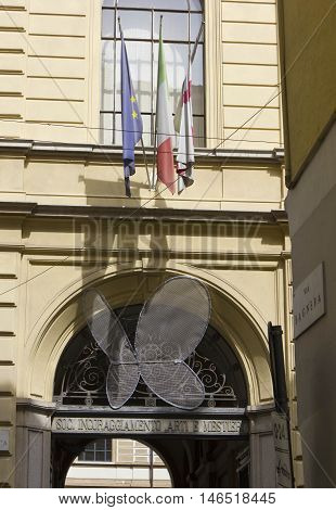 MILAN, ITALY - APRIL 16 2015: Entrance of the Societa incoraggiamento Arti e Mestieri in Milan Italy