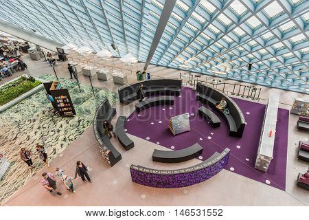 Seattle, USA - April 15, 2016: Aerial view of main floor of the public Central Library with modern glass architecture