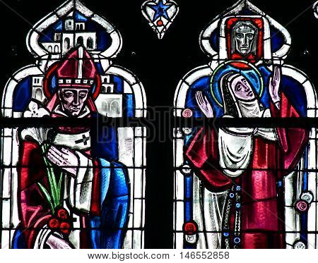 Poissy France - august 6 2016 : stained glass window of the historical collegiate church where the king Saint Louis was baptised