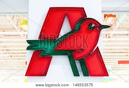 ST. PETERSBURG RUSSIA - JULY 28 2016: Auchan trade mark. French distribution network Auchan united more than 1300 shops