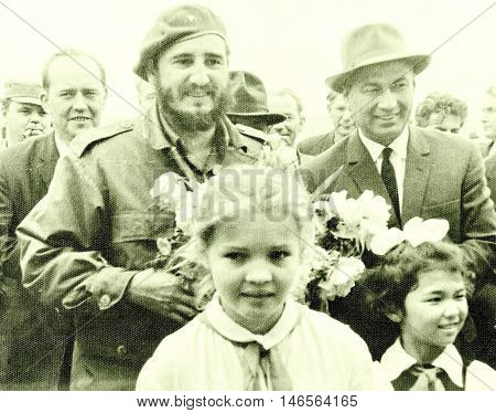 Yangiyer Uzbekistan - May 11 1963: Castro and Rashidov with pioneer girls.