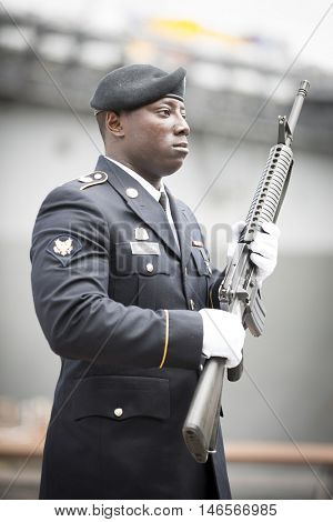 NEW YORK MAY 30 2016: Personnel from the US Army 99th Regional Support Command, Fort Dix, NJ prior to the rifle salute at the Memorial Day Observance service on the Intrepid Sea, Air & Space Museum.