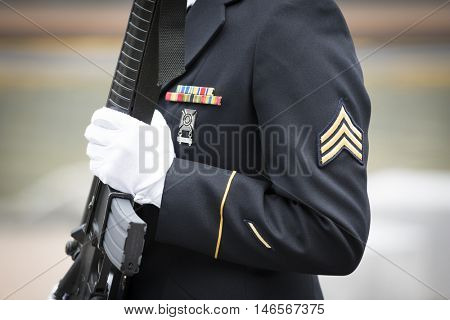NEW YORK MAY 30 2016: Personnel from the US Army 99th Regional Support Command, Fort Dix, NJ prior to the rifle salute at the Memorial Day Observance service on the Intrepid Sea, Air & Space Museum.