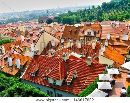View from above to tiled roofs of old town panorama of Prague Czech republic