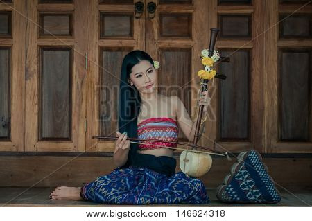 The girl in the class and a good melody to traditional Thailand.