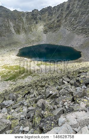 Panoramic view to Ledenoto (Ice) Lake from Musala Peak, Rila mountain, Bulgaria