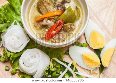 green curry beef with rice noodles is Thai food menu spicy and tasty.