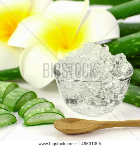 Pure Aloe Vera Gel On Aloe Vera Leaves And Plumeria Background.