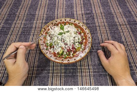 Eating Traditional Shopska Salad