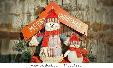 Merry Cristmas snowmen. Holiday concept. Snowmen toy in summer