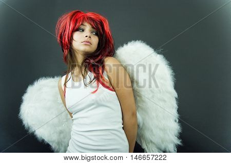 Nervous Redhead With Wings
