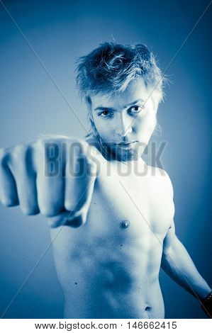 Tough Male Throwing Punch